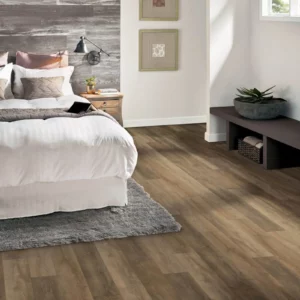 Luxury vinyl plank flooring in bedroom | Carpet Warehouse