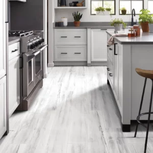 Luxury vinyl plank flooring in kitchen | Carpet Warehouse